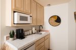 Casita includes kitchenette with microwave, dishwasher, and coffee maker